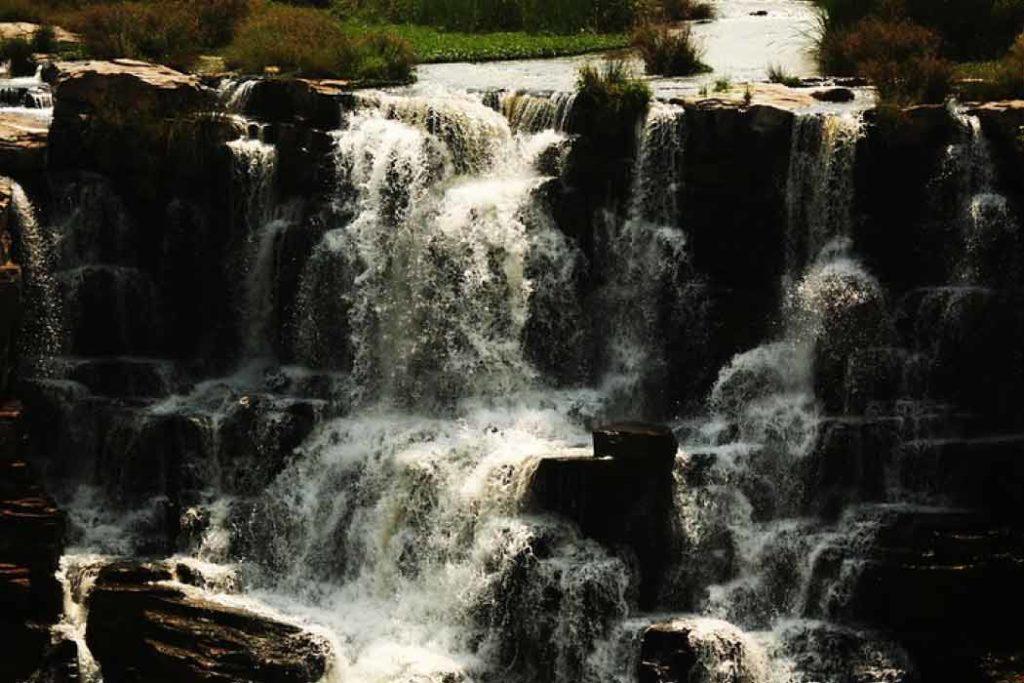 The beautiful gushing waters of the Ethipothala Waterfall 